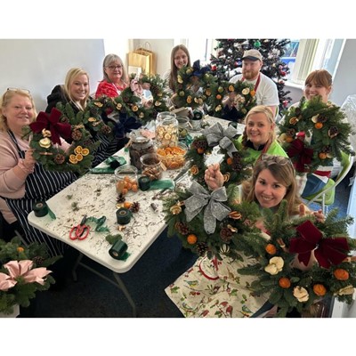 Parents at our Be Together Event, making Christmas Wreaths